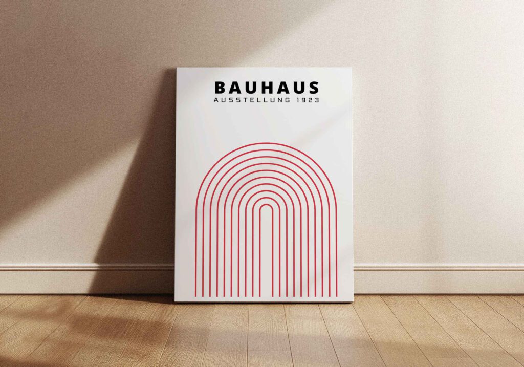 Poster som visar En vit poster med texten "BAUHAUS AUSSTELLUNG 1923" överst, och nedtill ett stort motiv av koncentriska, rödrosa bågformade linjer.